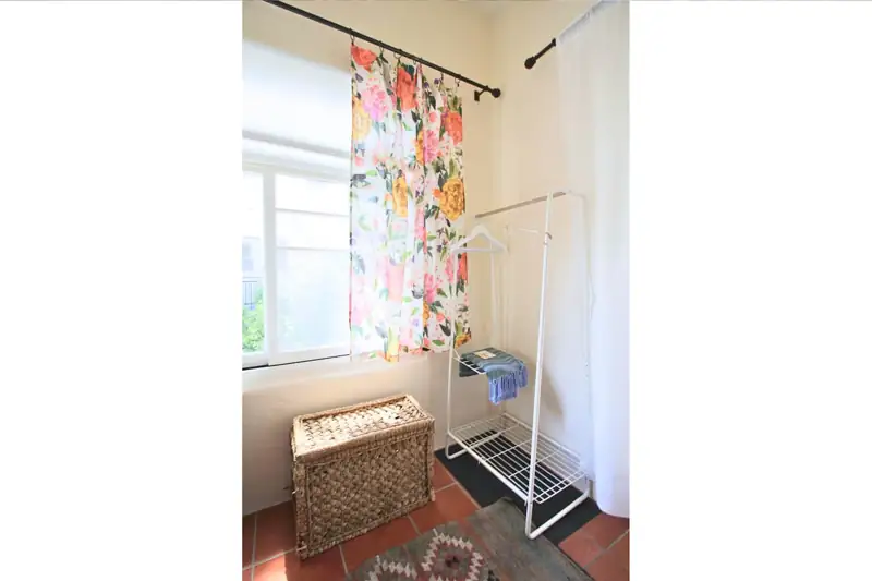 Bedroom #2 / Clothing rack & beach basket